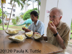 Sara and Merlin enjoying durian outside the university.