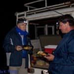 Merlin and Koos taking a break from bat netting to eat a South African favorite dish--bobotie http://en.wikipedia.org/wiki/Bobotie