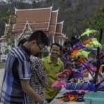 Bat toy maker/seller on grounds of temple grounds on weekend nights.