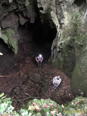 Looking down at Teresa and Merlin inside Tamana Cave.