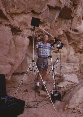 Merlin Tuttle photographing a small nursery colony of California myotis (Myotis californicus) in a Utah cliff face in 1992.
